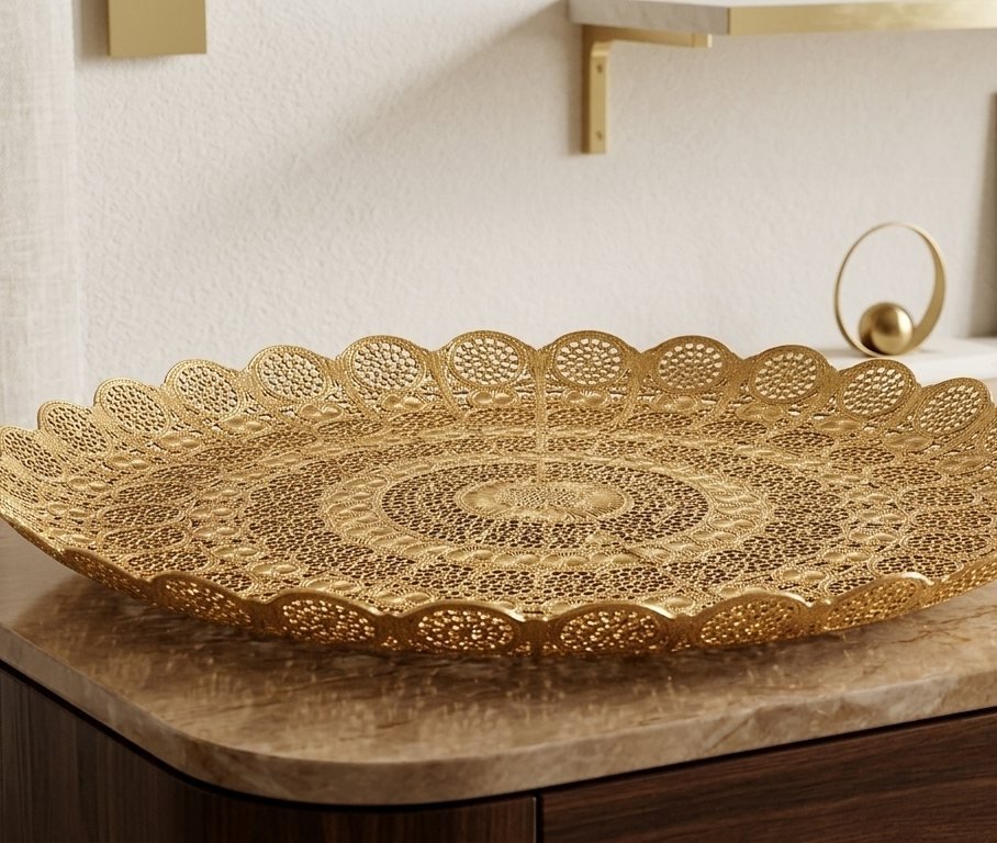 A gilt filigree charger plate